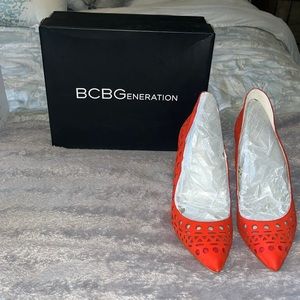 Brand new BCBG ladies shoes.. beautiful magnetic orange !!
